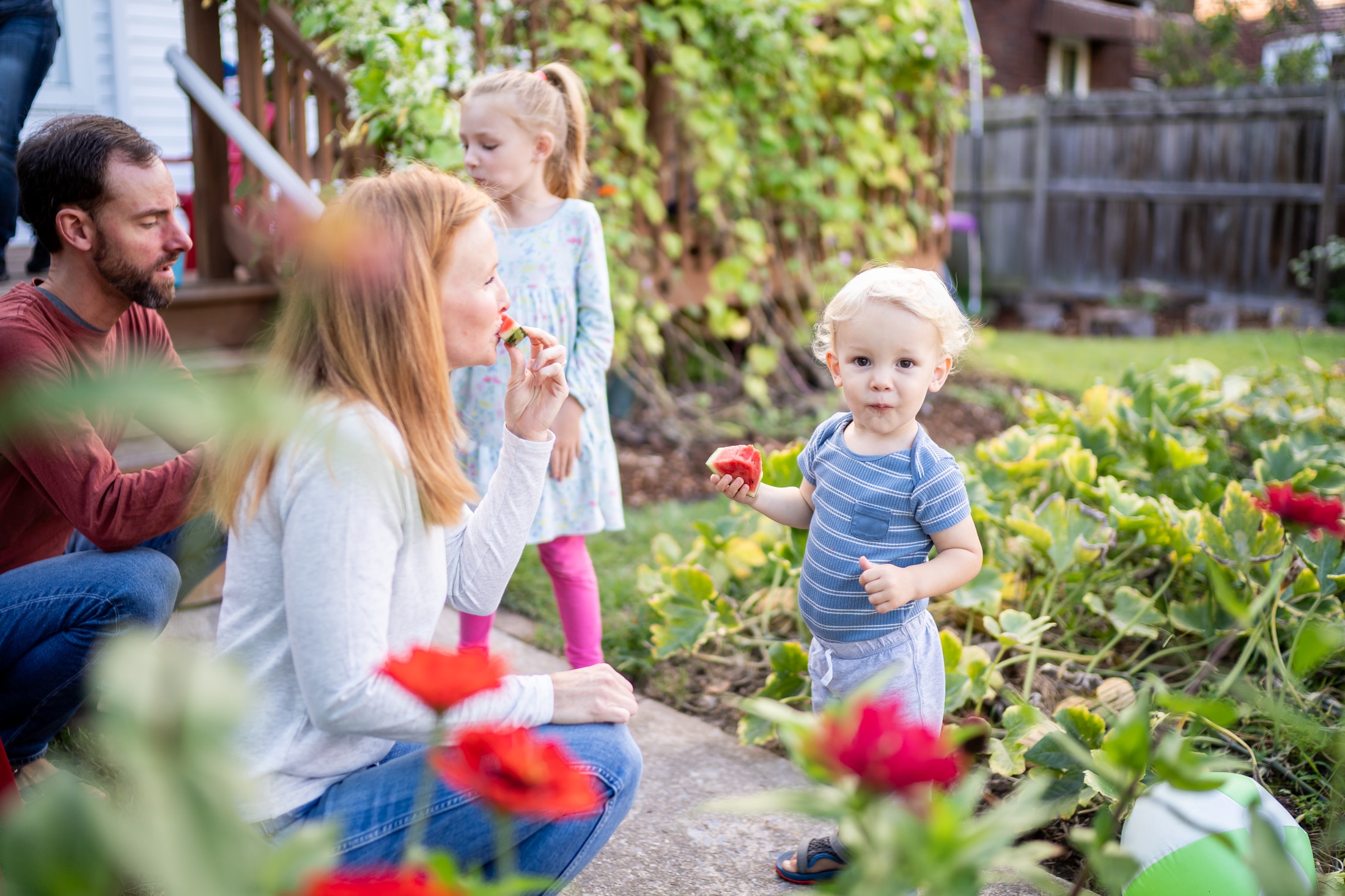 A perfect summer day captured: Jancey's family bonding over sticky watermelon slices.