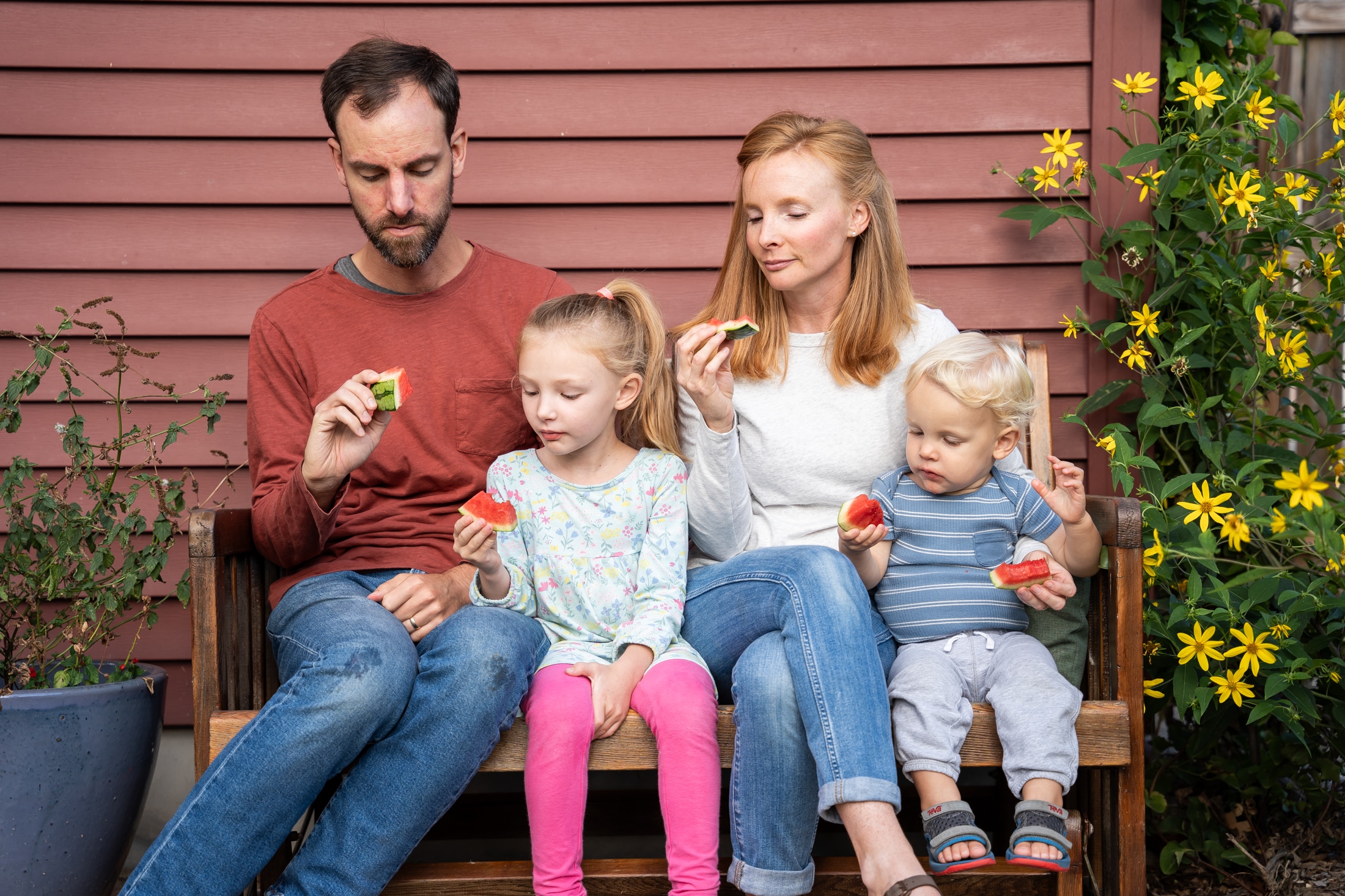 A perfect summer day captured: Jancey's family bonding over sticky watermelon slices.