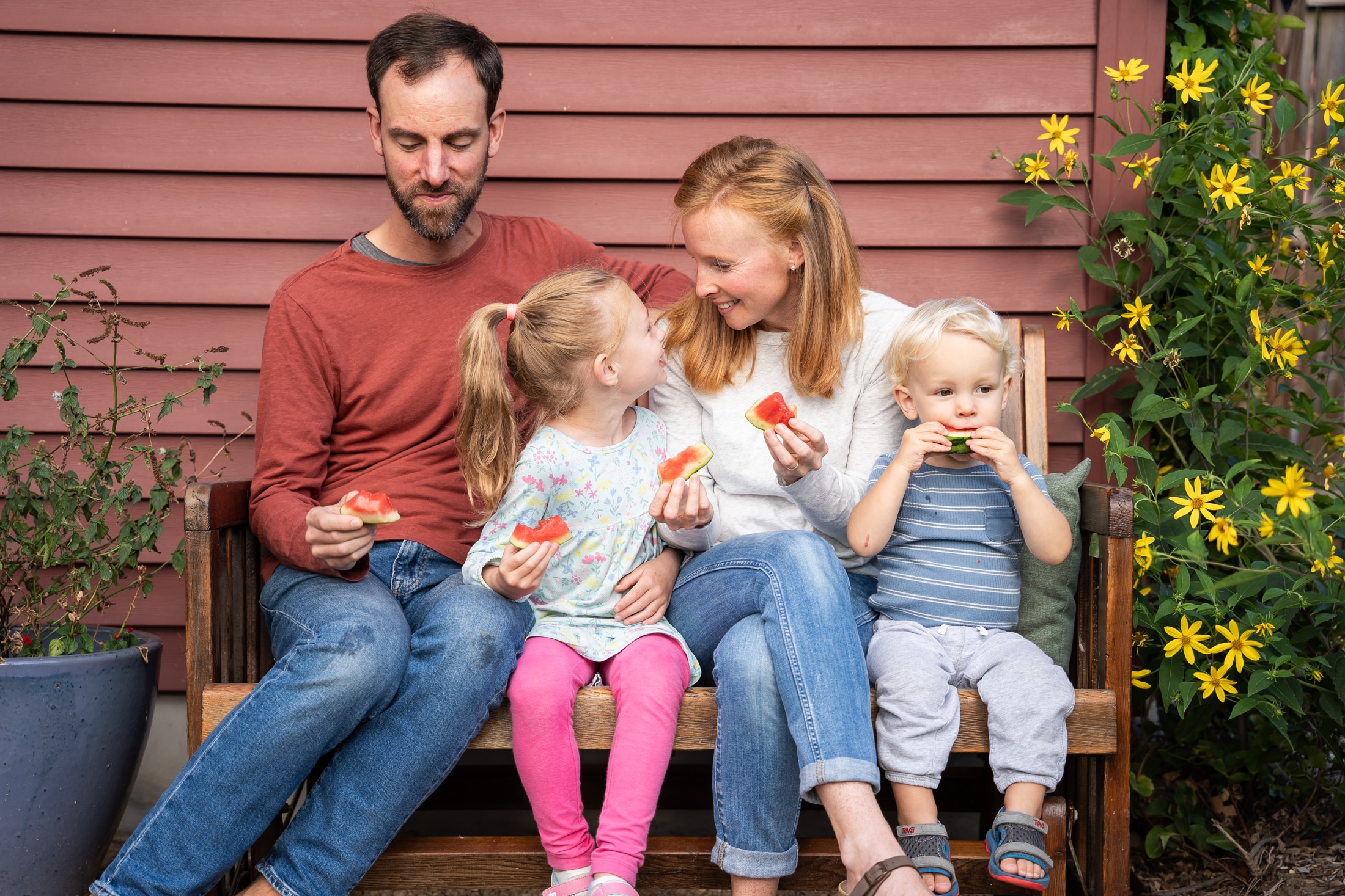 A perfect summer day captured: Jancey's family bonding over sticky watermelon slices.