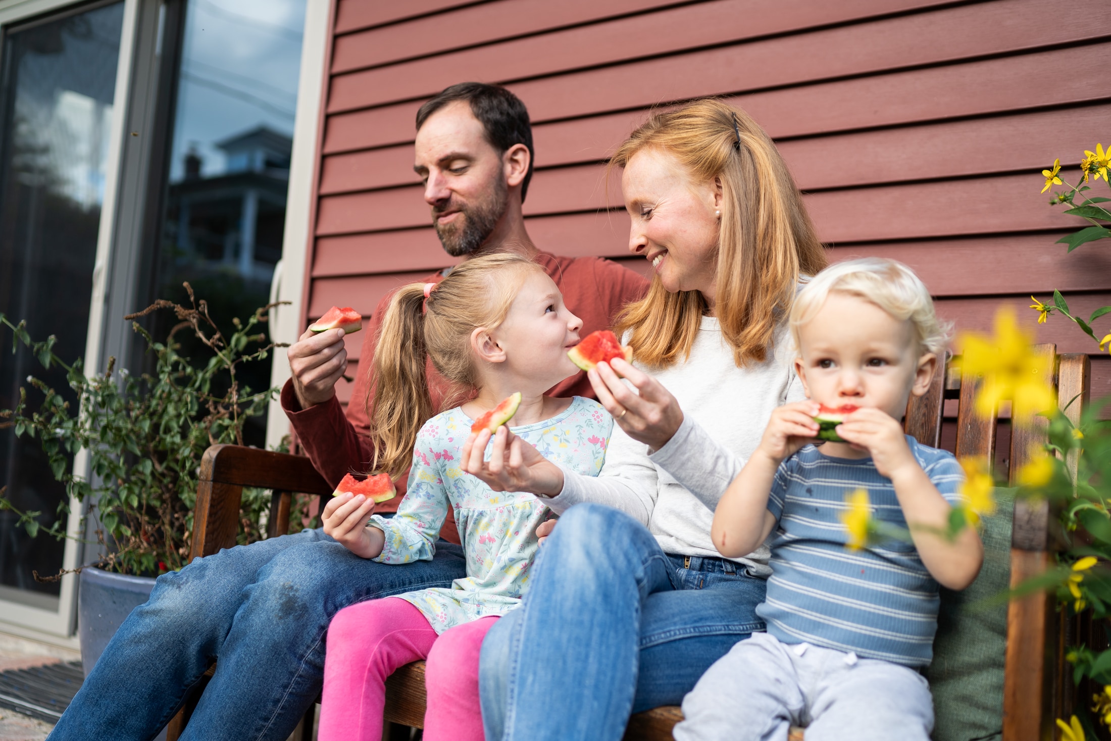A perfect summer day captured: Jancey's family bonding over sticky watermelon slices.