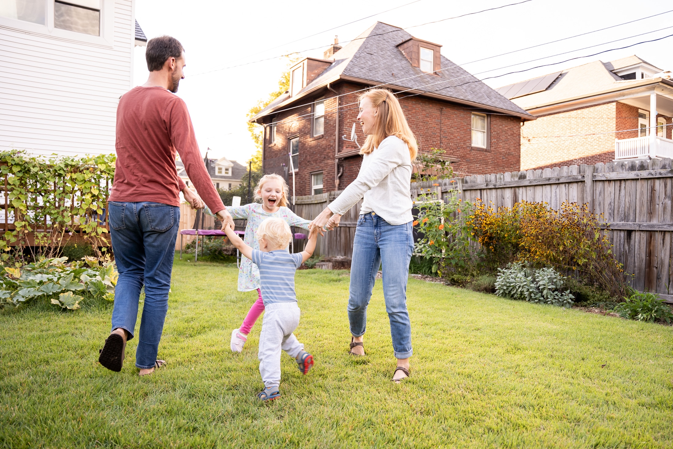 Ring-around-the-rosey fun: Jancey's family embracing the playful spirit of summer.