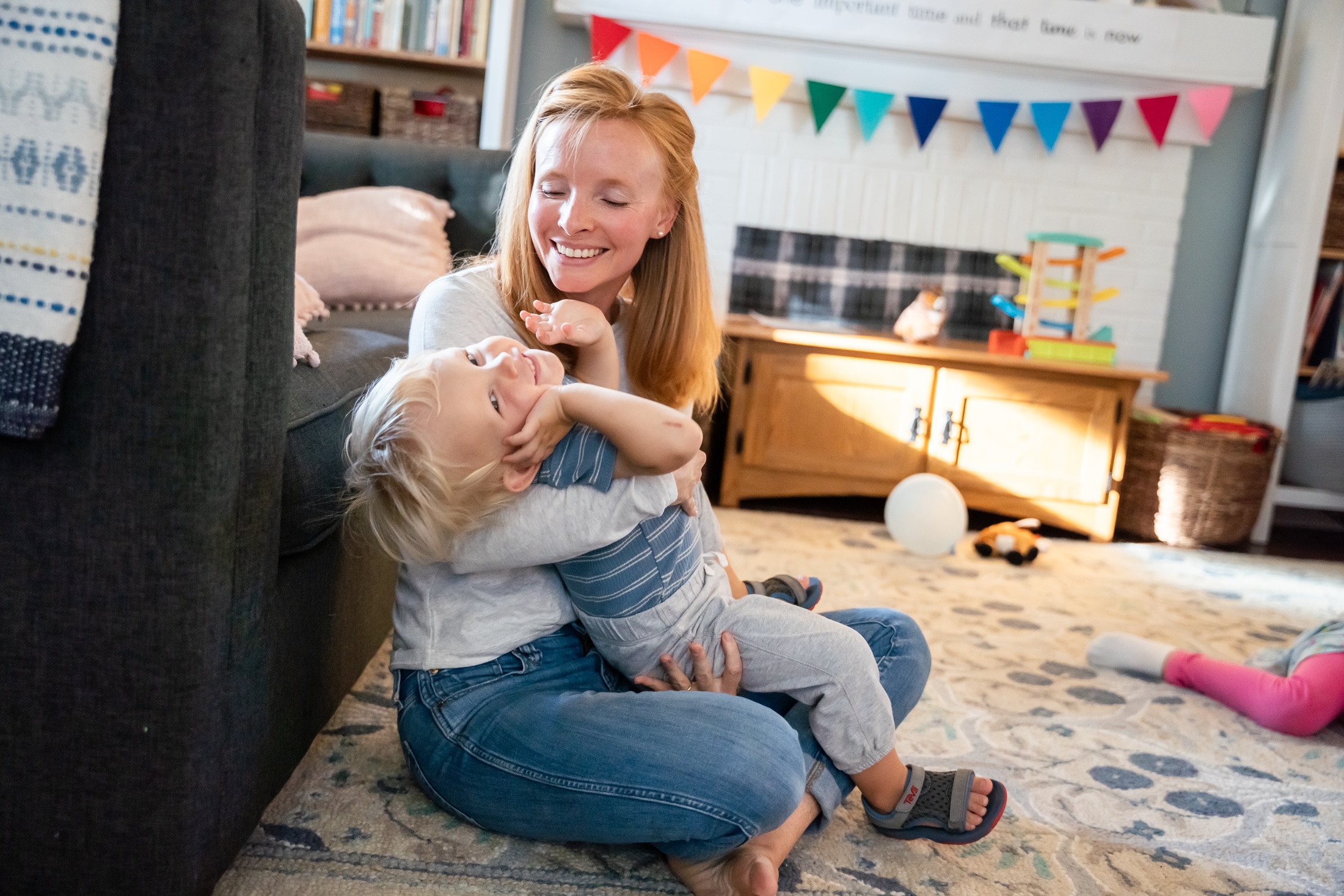 Candid family portrait capturing Jancey and her family's authentic joy and connection.