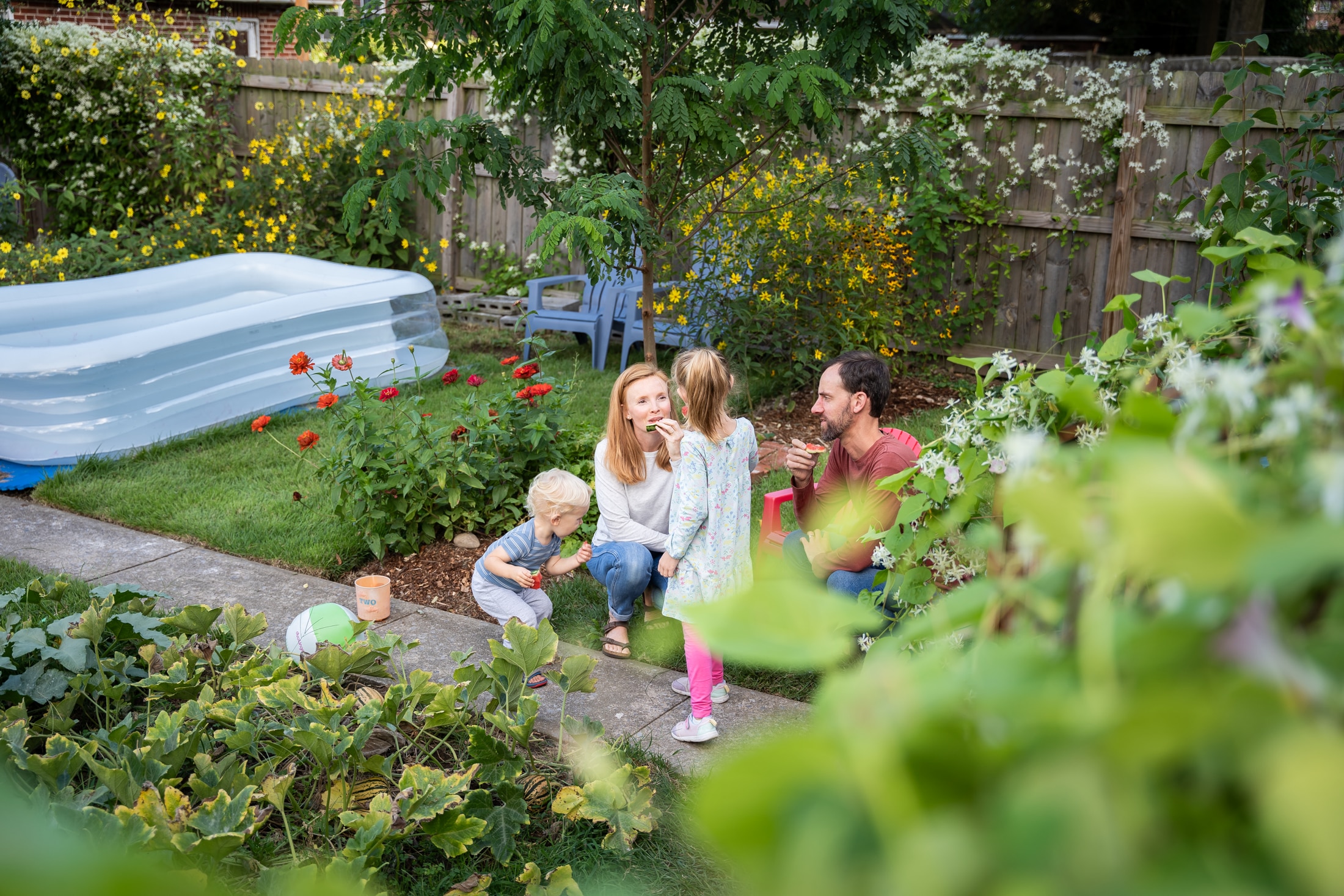 A perfect summer day captured: Jancey's family bonding over sticky watermelon slices.