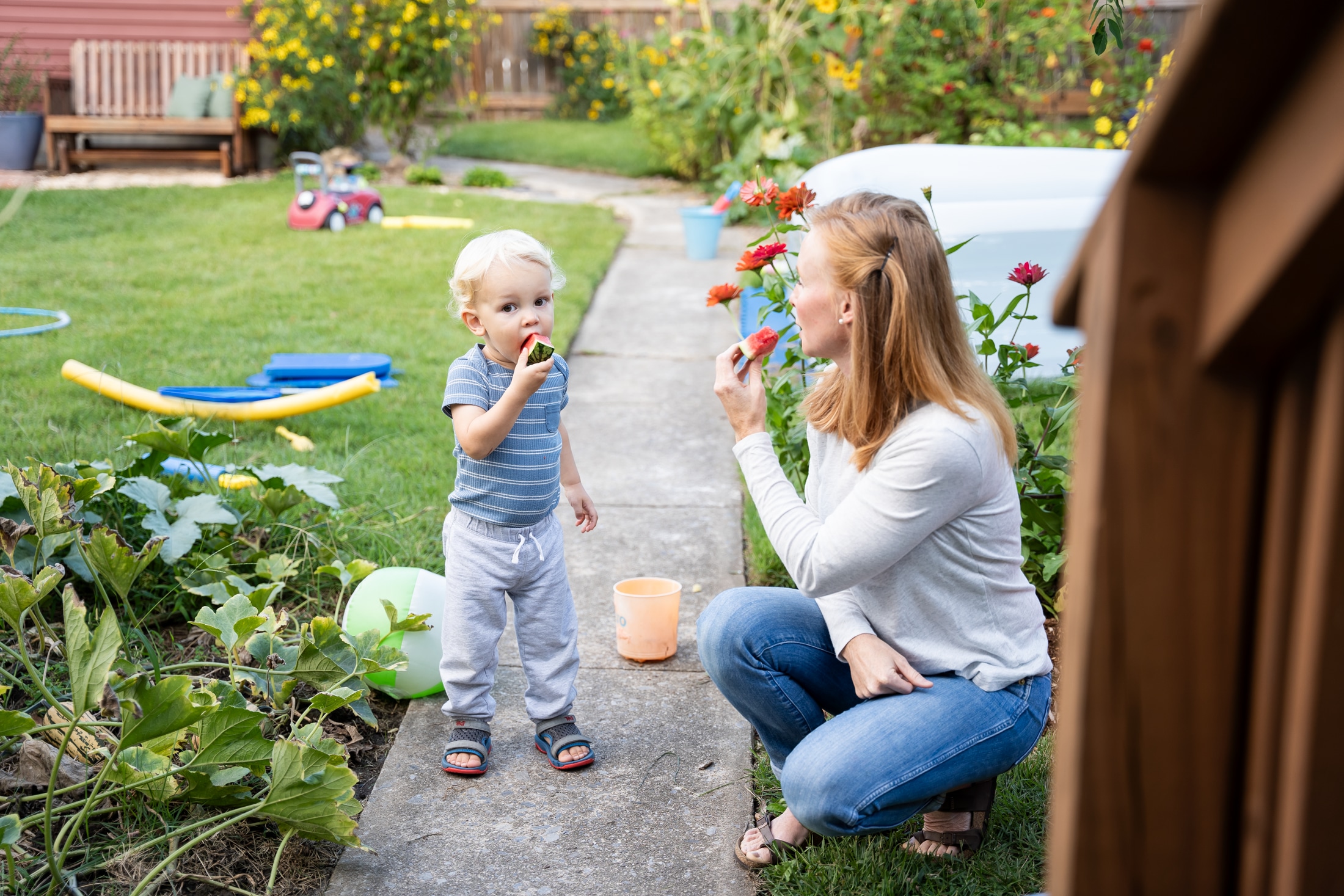 A perfect summer day captured: Jancey's family bonding over sticky watermelon slices.